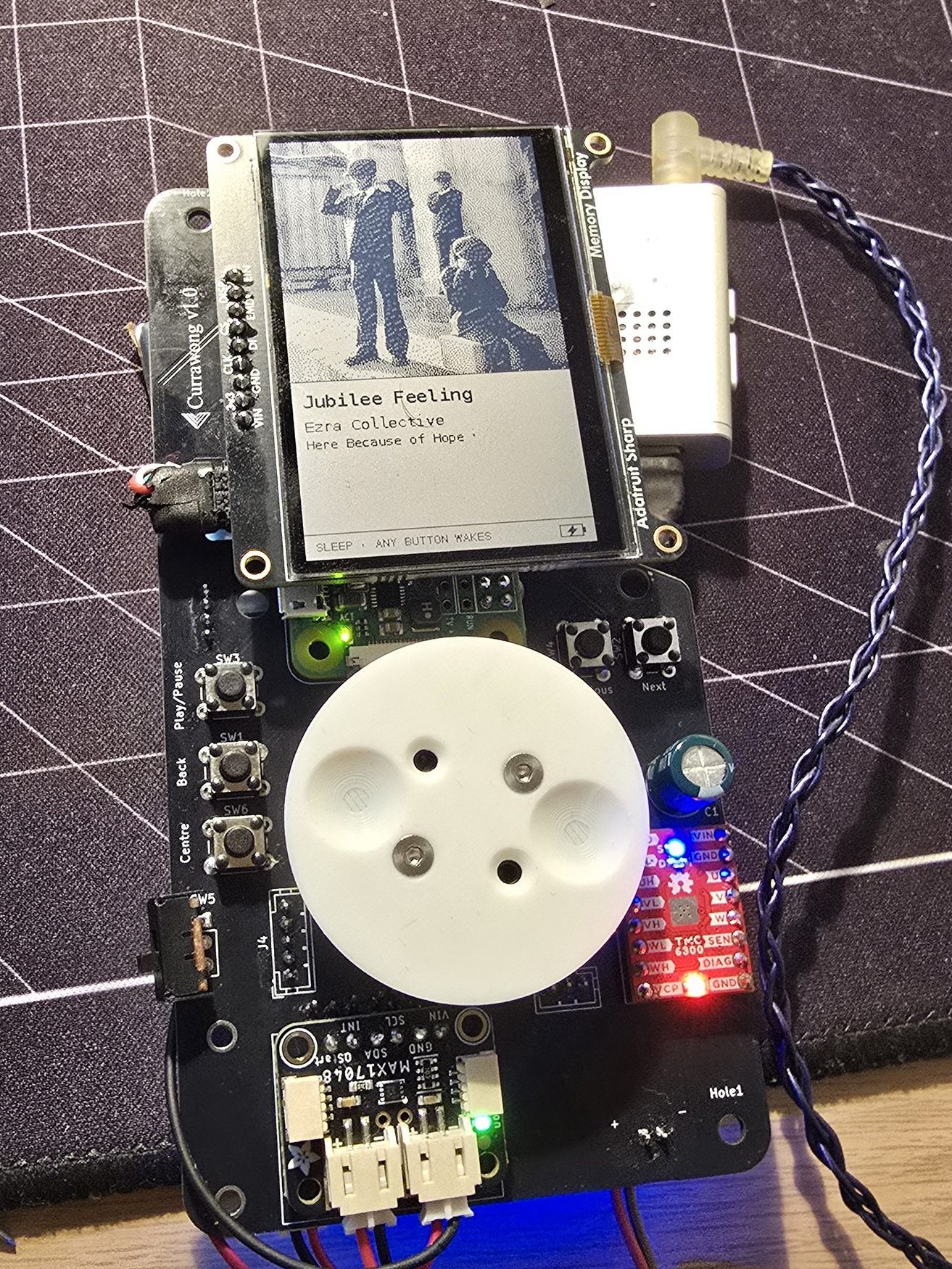 First assembly of the board, with the early smooth white dial cap over the motor