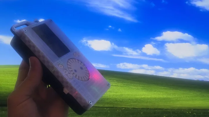 The finished Currawong held up against the Windows XP Bliss wallpaper